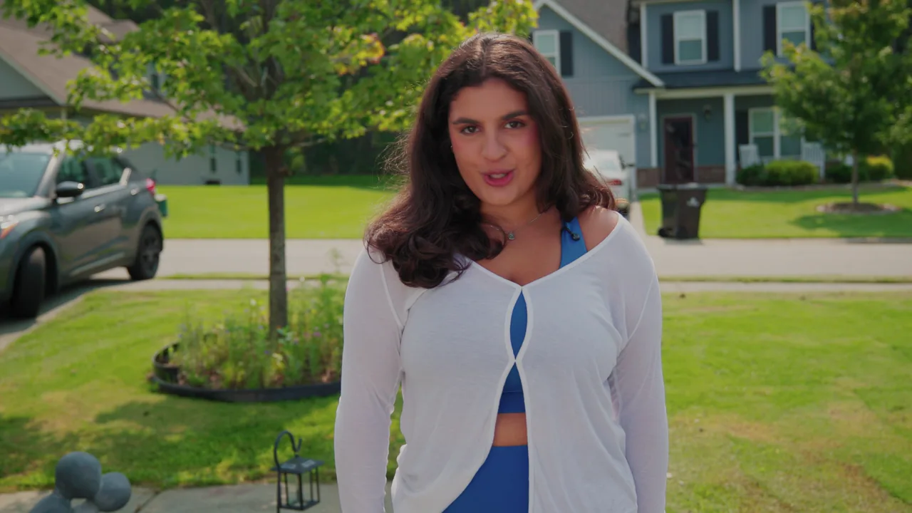 Maya standing in her front yard while sharing her BridgeWell weight-care story